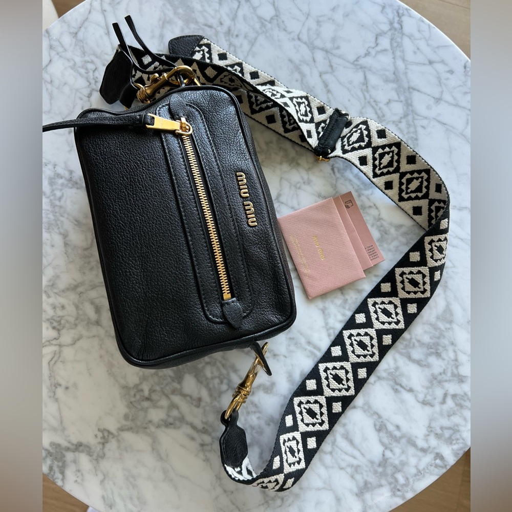 Miu Miu New black leather camera bag with ethnic strap